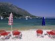 Beach Chairs With Umbrellas, Greece by Walter Bibikow Limited Edition Print