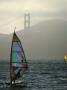 Winsdsurfer On San Francisco Bay Near The Golden Gate Bridge, San Francisco, California, Usa by Lawrence Worcester Limited Edition Print