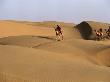 Camel Drivers Crossing Sam Sand Dunes, Jaisalmer, India by Corey Wise Limited Edition Print