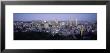 Buildings Lit Up At Dusk, Montreal, Quebec, Canada by Panoramic Images Limited Edition Print