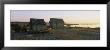Two Log Cabins On The Beach, Faro, Sweden by Panoramic Images Limited Edition Print