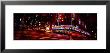 Buildings Lit Up At Night, Radio City Music Hall, Rockefeller Center, Manhattan, New York, Usa by Panoramic Images Limited Edition Print