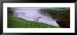 Tourists Standing Near The Waterfall, Gullfoss, Iceland by Panoramic Images Limited Edition Print