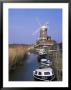 Boats On Waterway And Windmill, Cley Next The Sea, Norfolk, England, United Kingdom by Jeremy Bright Limited Edition Print