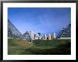 Muttart Conservatory With City Skyline In Distance, Edmonton, Alberta, Canada by Stephen Saks Limited Edition Print