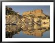 Yachts Moored In The Harbour, With The Citadel Behind, Bonifacio, Corsica, (France) by Michael Busselle Limited Edition Print