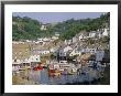 The Harbour And Village, Polperro, Cornwall, England, Uk by Philip Craven Limited Edition Print