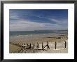 Wooden Groyne On The Beach At Amroth, Pembrokeshire, Wales, United Kingdom by Rob Cousins Limited Edition Print