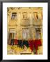 Washing Line Of Colourful Laundry In Old Town Buzet, Hilltop Village, Buzet, Istria, Croatia by Ken Gillham Limited Edition Print