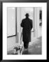 Poodle With Man, Lucerne, Switzerland by Walter Bibikow Limited Edition Print