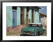 Typical Paved Street With Colourful Houses And Old American Car, Trinidad, Cuba, West Indies by Eitan Simanor Limited Edition Pricing Art Print