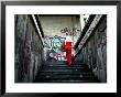 Woman Climbing Graffiti Stairwell, Belgrade, Serbia by Doug Mckinlay Limited Edition Pricing Art Print