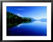 Reflections In Lake Mcdonald, Glacier National Park, Montana by Holger Leue Limited Edition Print