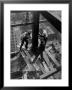 Workmen Attach Steel Beams Above Street During Construction Of The Manhattan Company Building by Arthur Gerlach Limited Edition Print