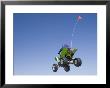 Airborne Atv Rider, Pismo Beach, California by Brent Winebrenner Limited Edition Pricing Art Print