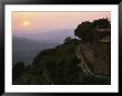 Man Walking At Sunrise On A Village Road In The Tuscan Countryside by O. Louis Mazzatenta Limited Edition Print