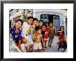 Group Of Children In Street, Kampot, Cambodia by Christopher Groenhout Limited Edition Print