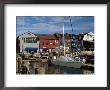 Moored Yacht And Wooden Buildings On The Waterfront At Bannister And Bowens Wharves, Rhode Island by Fraser Hall Limited Edition Print