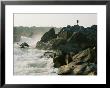 Kayaker Carries Boat Up The Rocks Of Great Falls On The Potomac River by Skip Brown Limited Edition Print