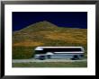 Panned View Of A Bus On Interstate 15 by Raymond Gehman Limited Edition Print