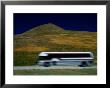 Panned View Of A Bus On Interstate 15 by Raymond Gehman Limited Edition Pricing Art Print