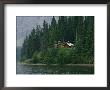 A Traditional Hunting And Fishing Lodge Built On Cli Lake by Raymond Gehman Limited Edition Print