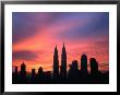 City Skyline At Sunrise Dominated By Petronas Twin Towers, Kuala Lumpur, Malaysia by Manfred Gottschalk Limited Edition Print