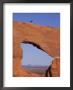 Cyclist On Natural Arch by Bill Hatcher Limited Edition Pricing Art Print