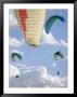 View From Below At Soaring Paragliders Against A Cloudy Sky, Near Draper, Utah by Skip Brown Limited Edition Print