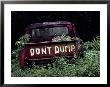 An Abandoned Vehicle Ironically Bears A Sign Warning Against Dumping by Chris Johns Limited Edition Pricing Art Print