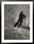Ice Skater With A Hockey Stick On The Frozen C And O Canal by Skip Brown Limited Edition Pricing Art Print