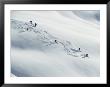 Six Skiers Make Their Way Down A Snow-Covered Hill by Paul Chesley Limited Edition Pricing Art Print