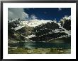 A Scenic View Of Lake Oesa In Yoho National Park by Michael Melford Limited Edition Print