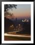 Car Light Trails At Night, View Of Old Town And City Centre, Vilnius by Christian Kober Limited Edition Print