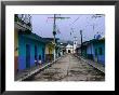 Painted Row Of Houses With Distant Chapel In Acatlan, Veracruz, Mexico by Jeffrey Becom Limited Edition Print