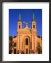 Flags Flying Atop The Polish Army's Field Cathedral, Warsaw, Poland by Krzysztof Dydynski Limited Edition Print