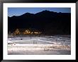 Ice Skating And Hockey On Evergreen Lake, Colorado, Usa by Chuck Haney Limited Edition Print