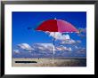 A Lone Beach Umbrella On Miami Beach, Miami, Florida, Usa by Richard Cummins Limited Edition Print