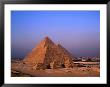 Pyramids Mycerinus, Chephren And Cheops At Giza With Cairo Suburbs In Background, Giza, Egypt by Anders Blomqvist Limited Edition Print