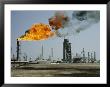 A Flame Spurts From An Oil Refinery In Saudi Arabia by W. Robert Moore Limited Edition Pricing Art Print