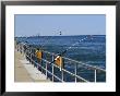 Fishing Poles Along St. Clair River, Port Huron, Mi by Dennis Macdonald Limited Edition Print