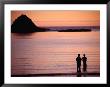 Two People Silhouetted In Sunset Over Sea, Sunset Bay State Park, Usa by Ryan Fox Limited Edition Pricing Art Print