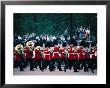 Marching Band Of Guards In Uniform, Part Of Changing Of The Guard At Buckingham Palace, England by Tony Wheeler Limited Edition Print