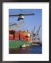 Crane Lifting Containers To And From Cargo Ship by Hans Peter Merten Limited Edition Print
