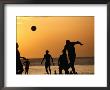Soccer Game On Beach At Sunset, Zanzibar Town, Zanzibar Island, Zanzibar West, Tanzania by Lawrence Worcester Limited Edition Print