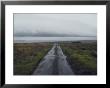 Wet Road Leading Off To Nowhere With A Storm Coming In From The Atlantic Ocean by Sam Abell Limited Edition Print