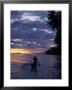 Native Fisherman In Outrigger Canoe, Indonesia by Yvette Cardozo Limited Edition Print