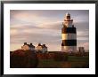 The Hook Head Lighthouse In County Wexford Was Built In The 13Th Century Ireland by Doug Mckinlay Limited Edition Print
