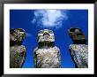 Traditional Moai Carved From Soft Volcanic Rock With Clouds Above, Ahu Tongariki, Chile by Brent Winebrenner Limited Edition Print