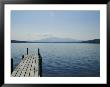 A Dock Juts Into The Serene Water Of Lake Pleasant by Stacy Gold Limited Edition Print